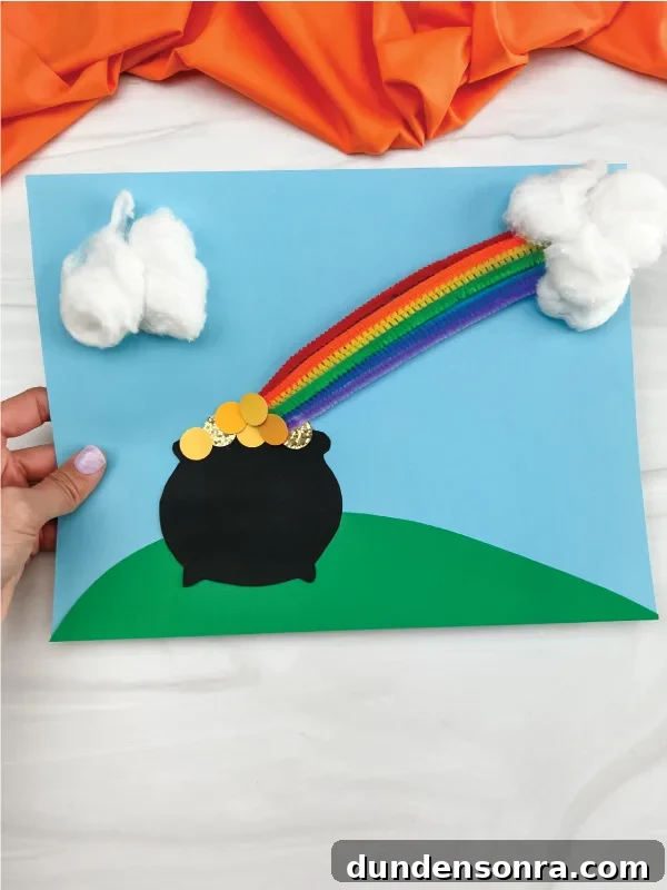 Pot of Gold Craft Pot of gold with rainbow coming out of it on a blue paper.