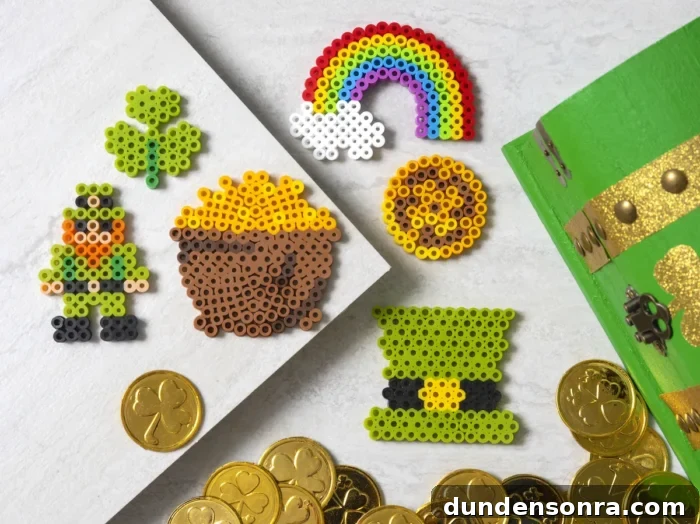 St. Patrick Perler Beads Leprechaun perler bead designs next to fake gold coins.