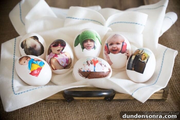 Eggs with photos printed on them on a kitchen towel. 