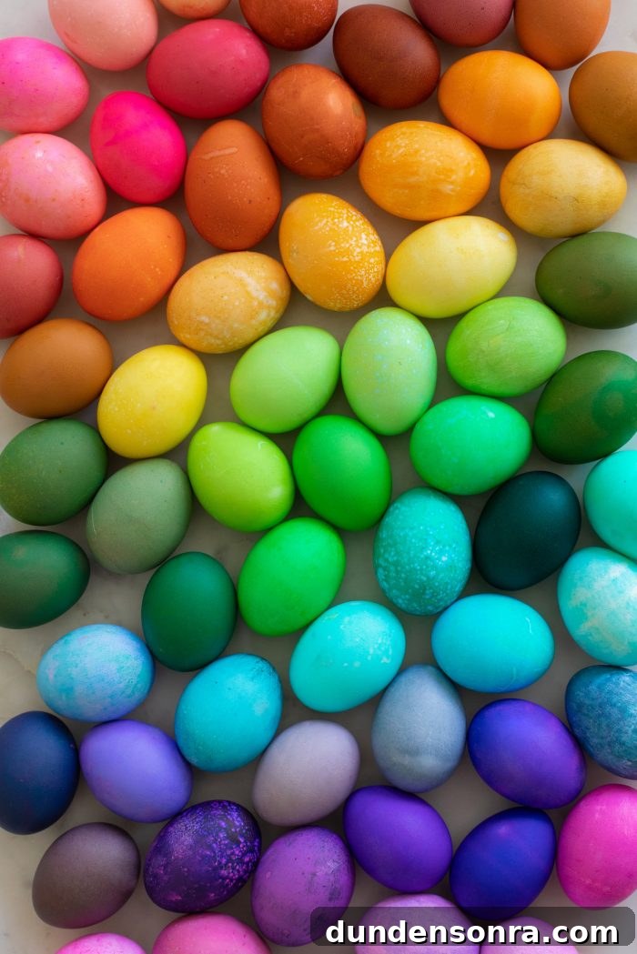 Rainbow Easter Eggs on a marble background. 