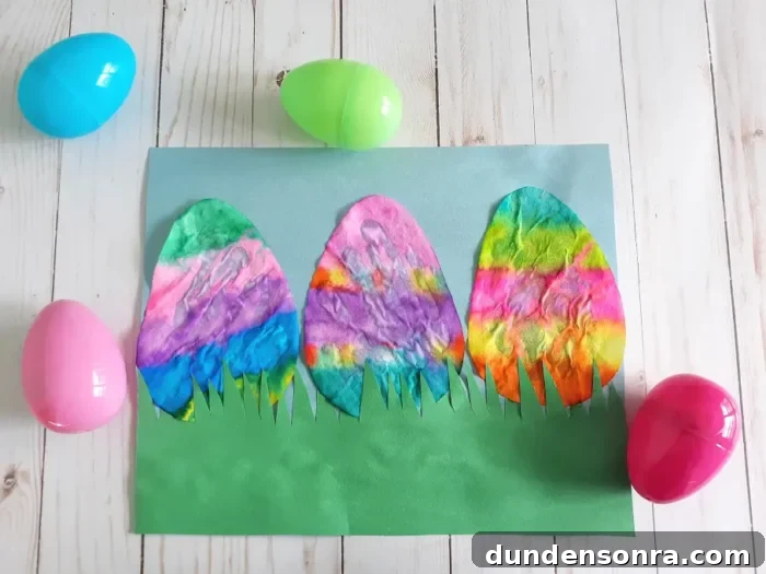 Easter eggs made from coffee filters on a wooden background. 