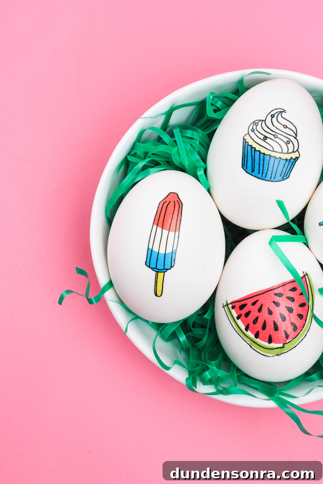 Eggs in a bowl with animated designs on them. 