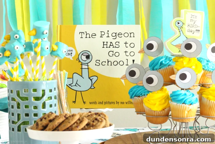 Mo Willem book next to pigeon cupcakes and pencils. 