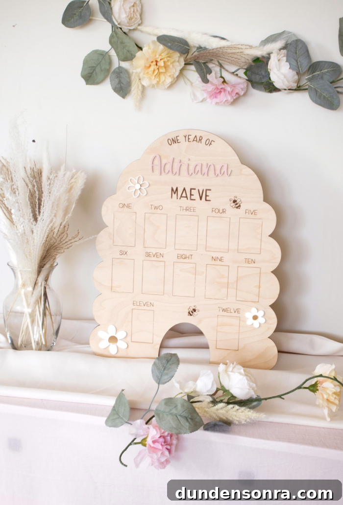 First Bee Day Birthday Party Calendar in the shape of a bee hive on a wall.