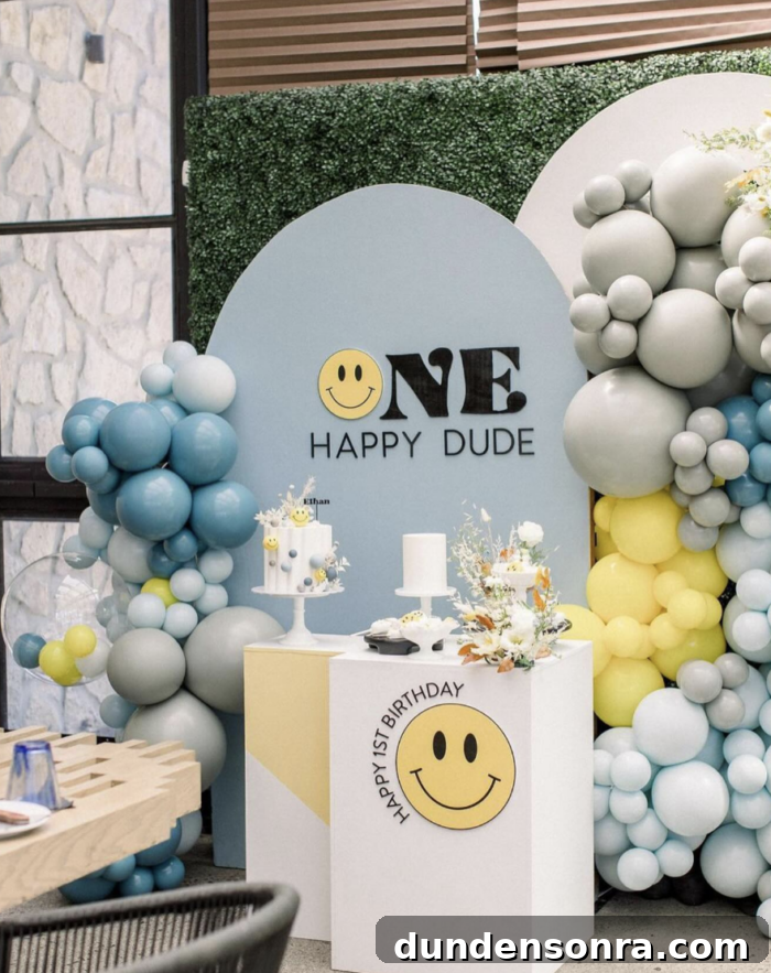 One Happy Dude Birthday Party Balloons around a cake table labeled with "one happy dude".