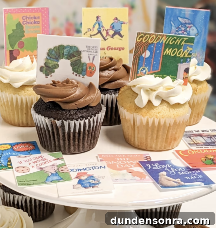 One for the Books Birthday Party Cupcakes with printed book designs.