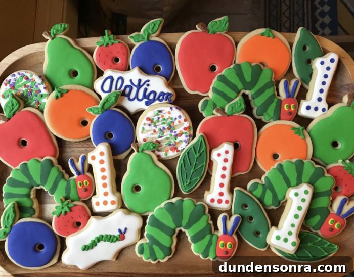 Very Hungry Caterpillar Party Plate of cookies with a "very hungry caterpillar" theme.