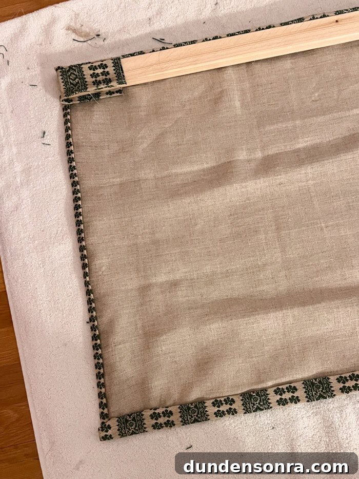 fabric glued to wooden board
