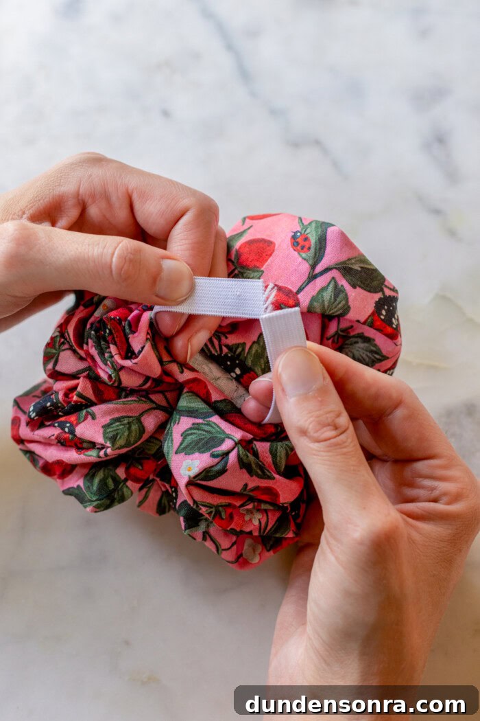 holding two ends of elastic in scrunchie