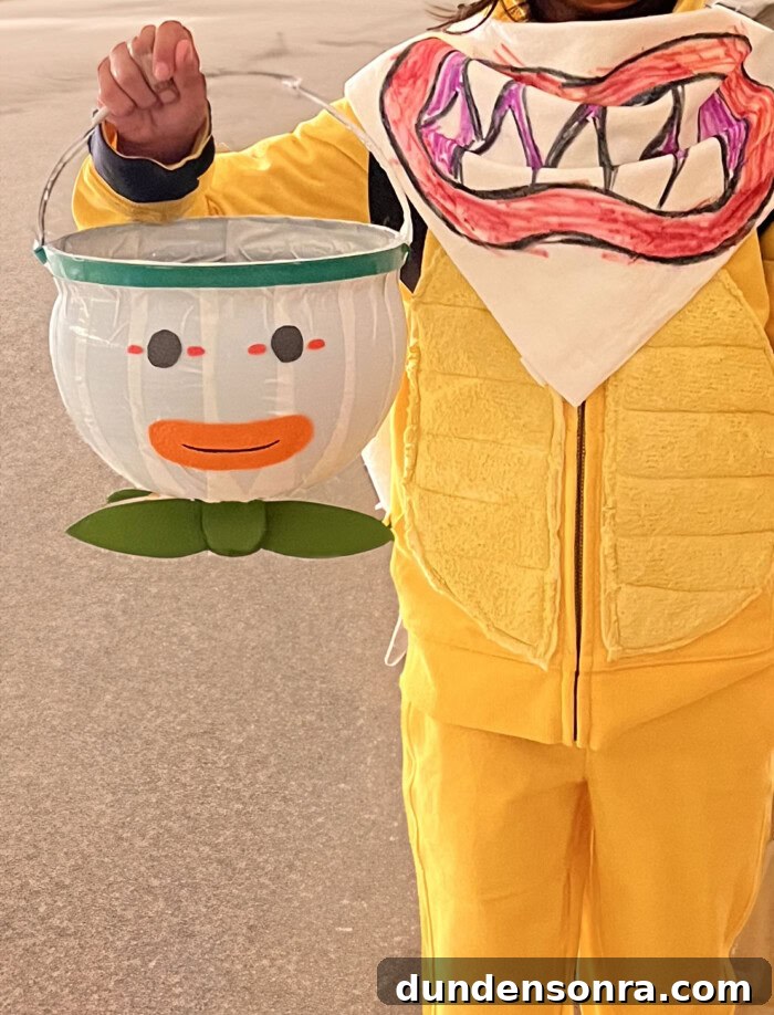 Child holding Clown Car treat bucket