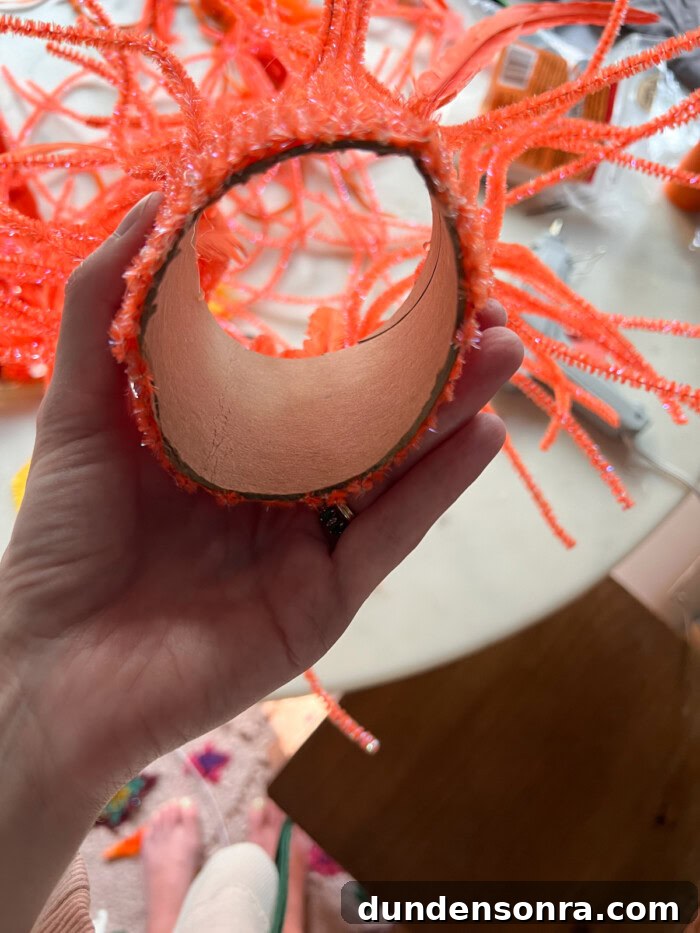 Showing inside of cardboard tube with pipe cleaners