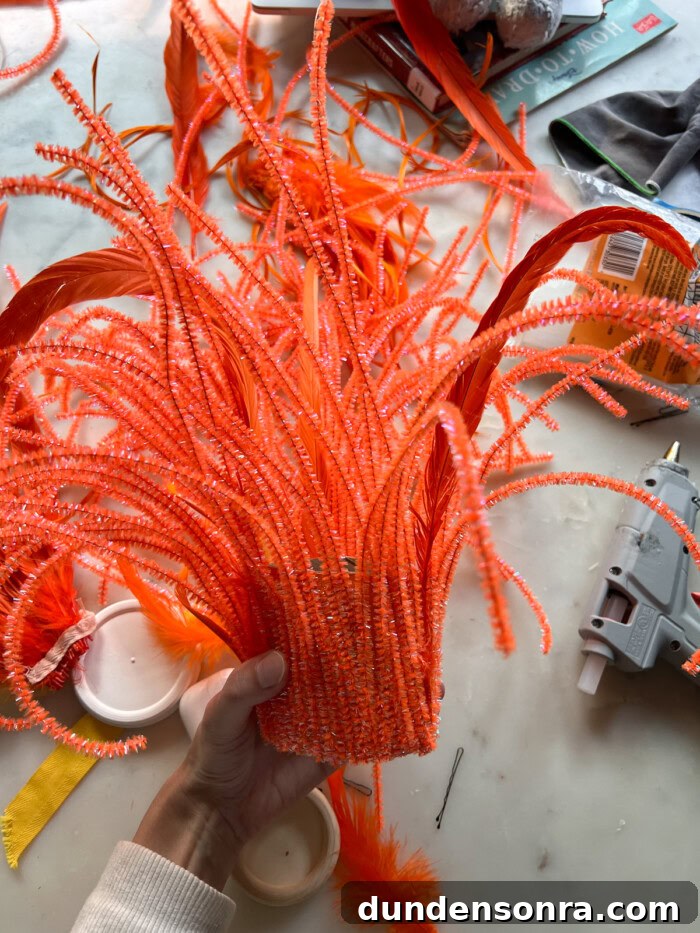Orange pipe cleaners to make Anxiety hair from Inside Out