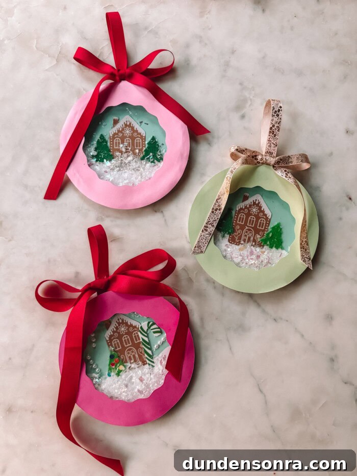 paper plate snow globes on marble