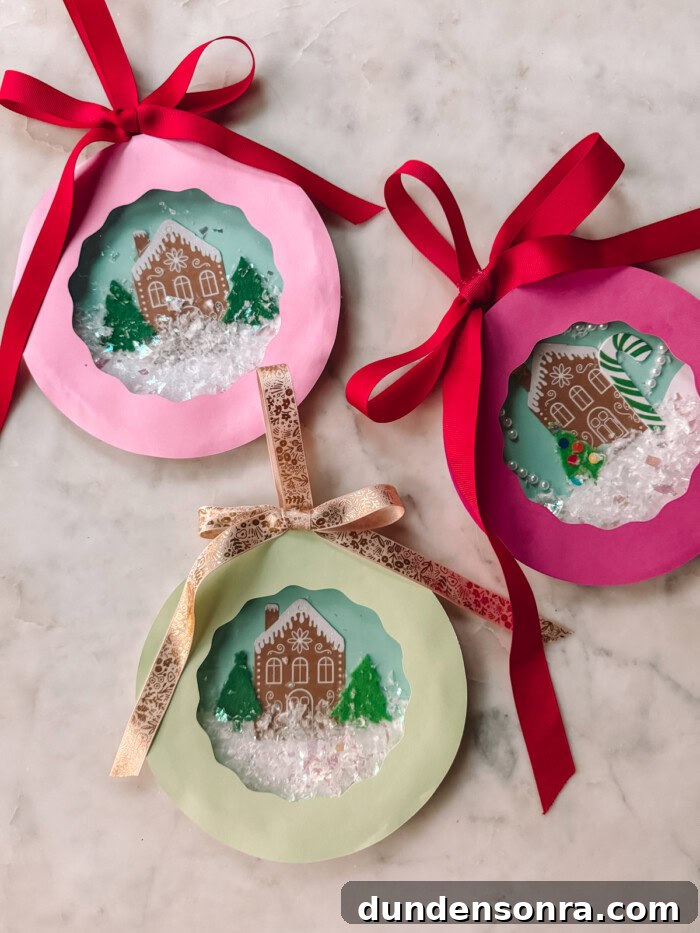 paper plate snow globes on marble