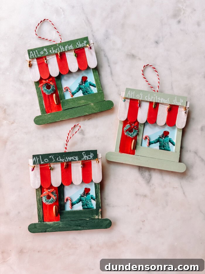 DIY Popsicle Stick Storefront Ornaments: Charming Mini Shop Decor 3 Popsicle Stick Storefront Ornaments on Marble