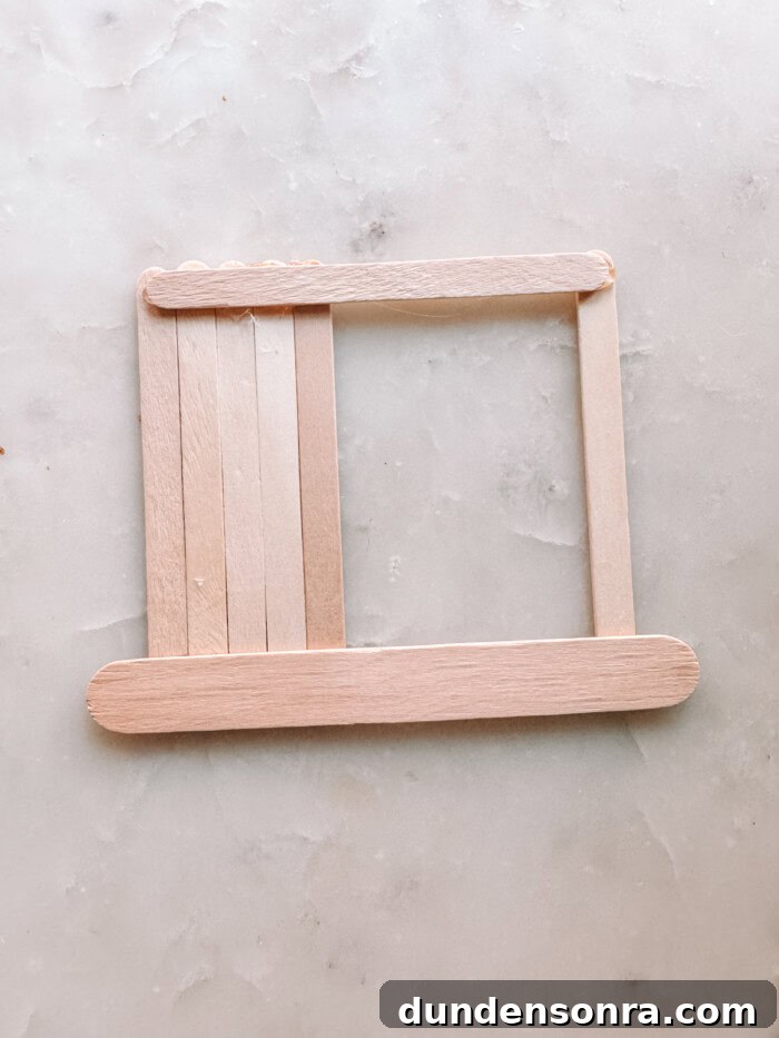 DIY Popsicle Stick Storefront Ornaments: Charming Mini Shop Decor 5 Popsicle Sticks on marble