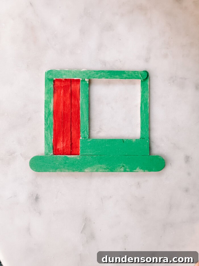 DIY Popsicle Stick Storefront Ornaments: Charming Mini Shop Decor 8 painted popsicle stick ornament