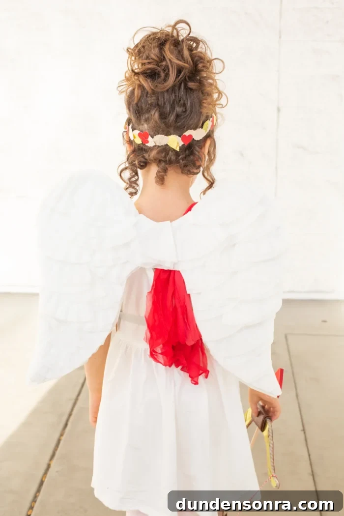 child in cupid costume
