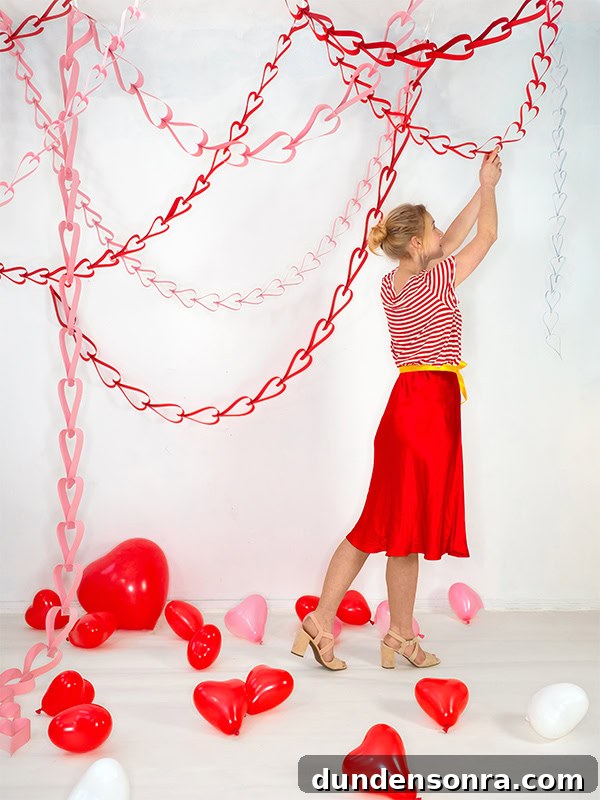 Creative Valentine's Day Classroom Party Ideas for Every Grade 9 paper heart garlands