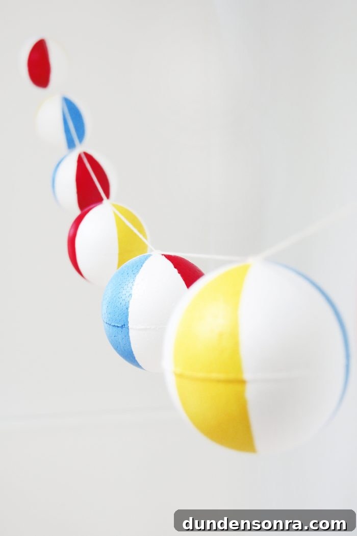 DIY Pool Party Beach Ball Garland for beach school dance theme