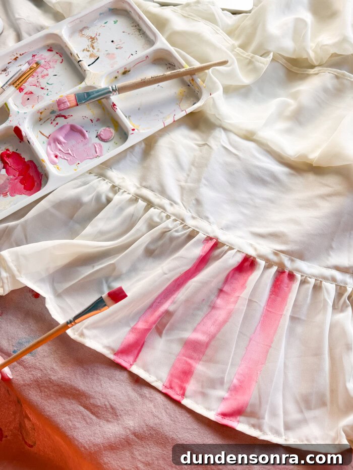 Mary Poppins Returns DIY Costume Ideas for Adults and Kids 4 painting pink stripes on skirt