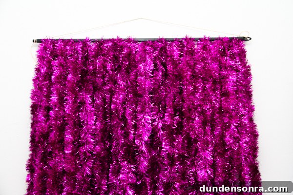 DIY Tinsel Photobooth Backdrop DIY Tinsel Photobooth Backdrop