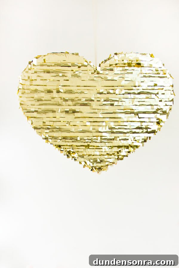 DIY Gold Heart Piñata Tutorial: Step-by-Step Guide for Parties 20 DIY Mylar Fringe Heart Pinata