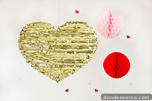 DIY Gold Heart Piñata Tutorial: Step-by-Step Guide for Parties 21 Valentines Day DIY Gold Mylar Heart Pinata